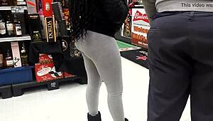 i spot this ebony shorty in tight spandex grabbing booze at the baltimore store, all candid and hidden outdoors