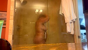 Mistress danie showers in pcb voyeuristically.