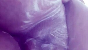 Wow, watch this gordita rub soap on her big tits!