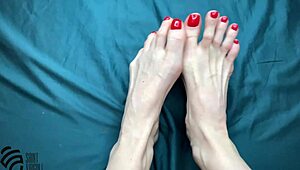 Footfetish with a new red pedicure