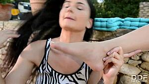 LUCY LI AND VANESSA STAYLON ENGAGE IN FOOT FETISH PLAY WITH STOCKINGS AND BARE FEET