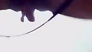 Totally naked girl shakes her ass and tits in a risky hotel corridor dance.