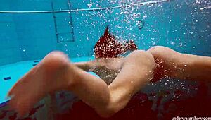 Petite babe Deniska with big tits swims naked in the pool. Her tight body drives me wild!