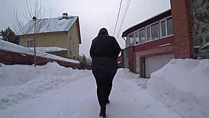 Hey, voyeur, see that curvy milf’s big ass under a short dress on a snowy street?