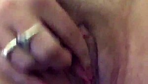 She's using a vibrator on her dry pussy lips 😏