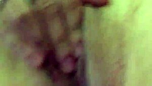 She's using a vibrator on her dry pussy lips 😏