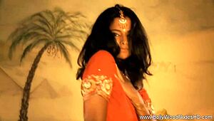 She Undresses and Dances Seductively!