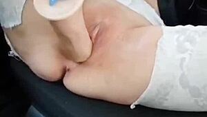 Girl Fucks Her Pussy with Rubber Dick in Taxi Back Seat