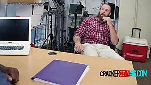 Watch the muscled white bear get pounded by that huge black cock!