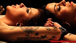 Imagine this lezdom mistress dominating bound submissives in intense bondage sessions