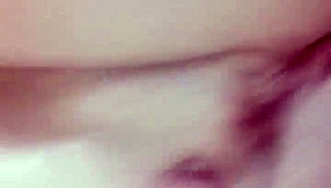 A girl gags and chokes on deepthroat while squirting intensely in a hardcore session.