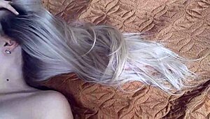 She teases with long blonde hair, fingering and kissing before cum on face