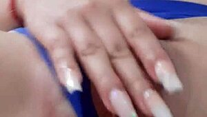 Young girl touches her vagina gently
