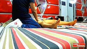 Perla Rica undergoes a full-body massage in the casting room.