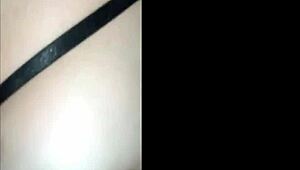 latina shaking her ass seductively in the room