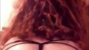 latina shaking her ass seductively in the room