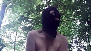 Female slave teases herself in the forest on July 24