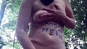 Female slave teases herself in the forest on July 24