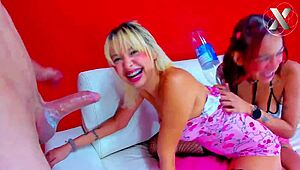 Blonde girl destroys throat in doggystyle threesome