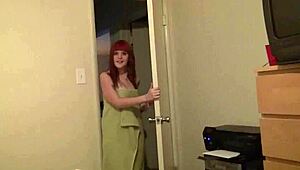 redhead gives blowjob in bedroom