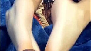 exotic beautiful teen giving footjob!