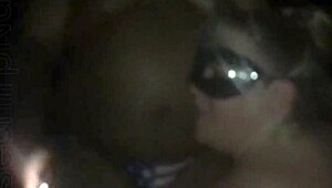 Hey, let's celebrate 4th of July with this masked blonde sucking my big black cock outdoors.