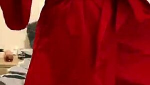 Watch this brunette tease in red lingerie?