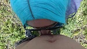 A student performs a blowjob in a public park