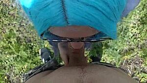 A student performs a blowjob in a public park