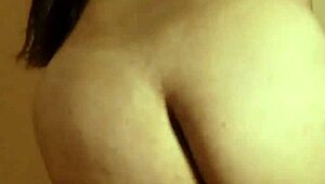 gostosa performs teasing striptease ripping clothes to show small tits
