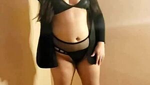 gostosa performs teasing striptease ripping clothes to show small tits