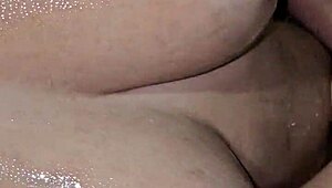 Mom in the bathroom gets steamy with a toy! 🔥