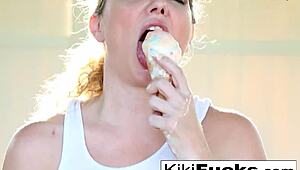 Kiki enjoys a messy ice cream treat