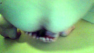 a guy uses a dildo for anal fun in his room