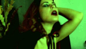 Sexy Devil Drips Hot Wax On Her Big Clit And Nipples During Fingering