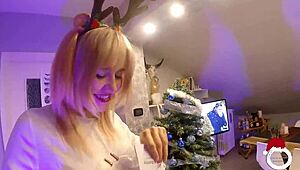 CHRISTMAS IS COMING, URSULA DECORATES THE TREE WHILE GETTING HELP