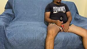 Your wife sits on my cock while watching TV in her dress.