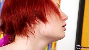 Redhead teen enjoys big cock in pussy without removing shirt.