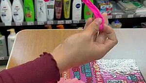 Asian Ladyboy Teases with Fresh Thong Display in Local Convenience Store Setting.