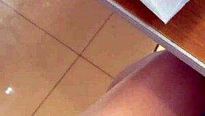 Asian Ladyboy Teases with Fresh Thong Display in Local Convenience Store Setting.