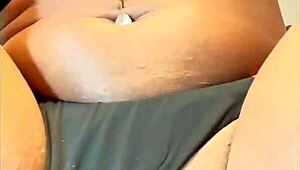 A woman in lingerie masturbates solo and cums.