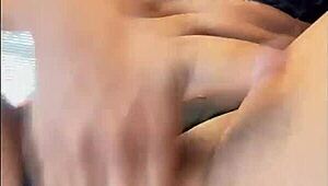 A woman in lingerie masturbates solo and cums.