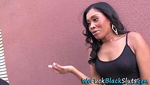 Ebony Babe Feels Intense Pleasure During Spitroast Blowbang, Leading to Explosive Bukkake Climax.