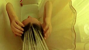 brett rossi lathers up her curvy blonde body in a steamy shower scene
