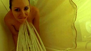 brett rossi lathers up her curvy blonde body in a steamy shower scene