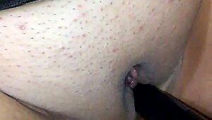 masked black babe uses dildo