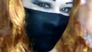 masked black babe uses dildo