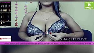 damn, hot janu strips her bra showing off those big tits!