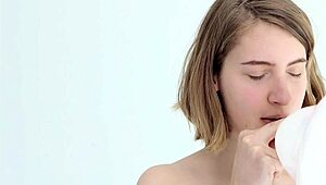 Young looner babe blowing and popping her first balloon, wow!