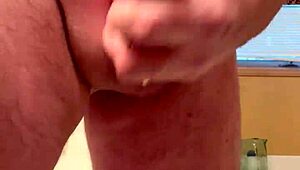 65 yr old man strokes an average cock in close-up solo.